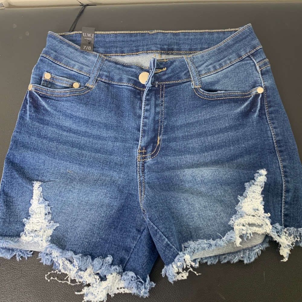 Never worn distressed shorts
